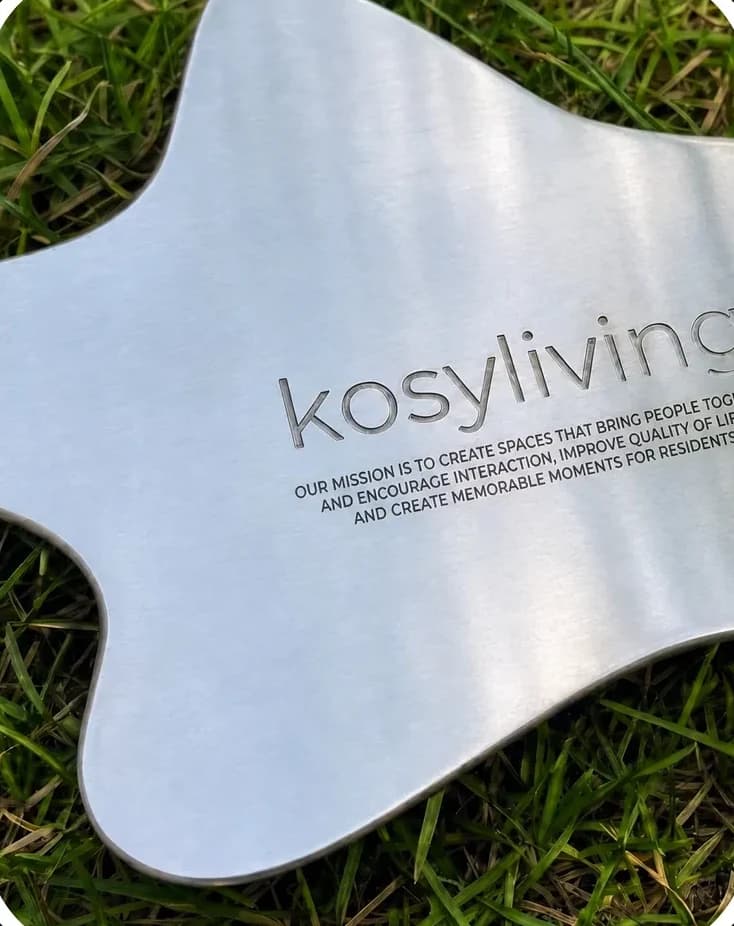 Kosy Living — a metal sign with the brand mission, laser engraved