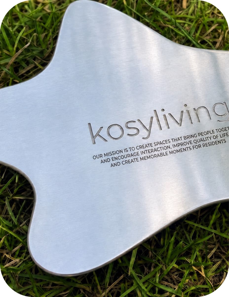Kosy Living — a metal sign carrying the brand mission