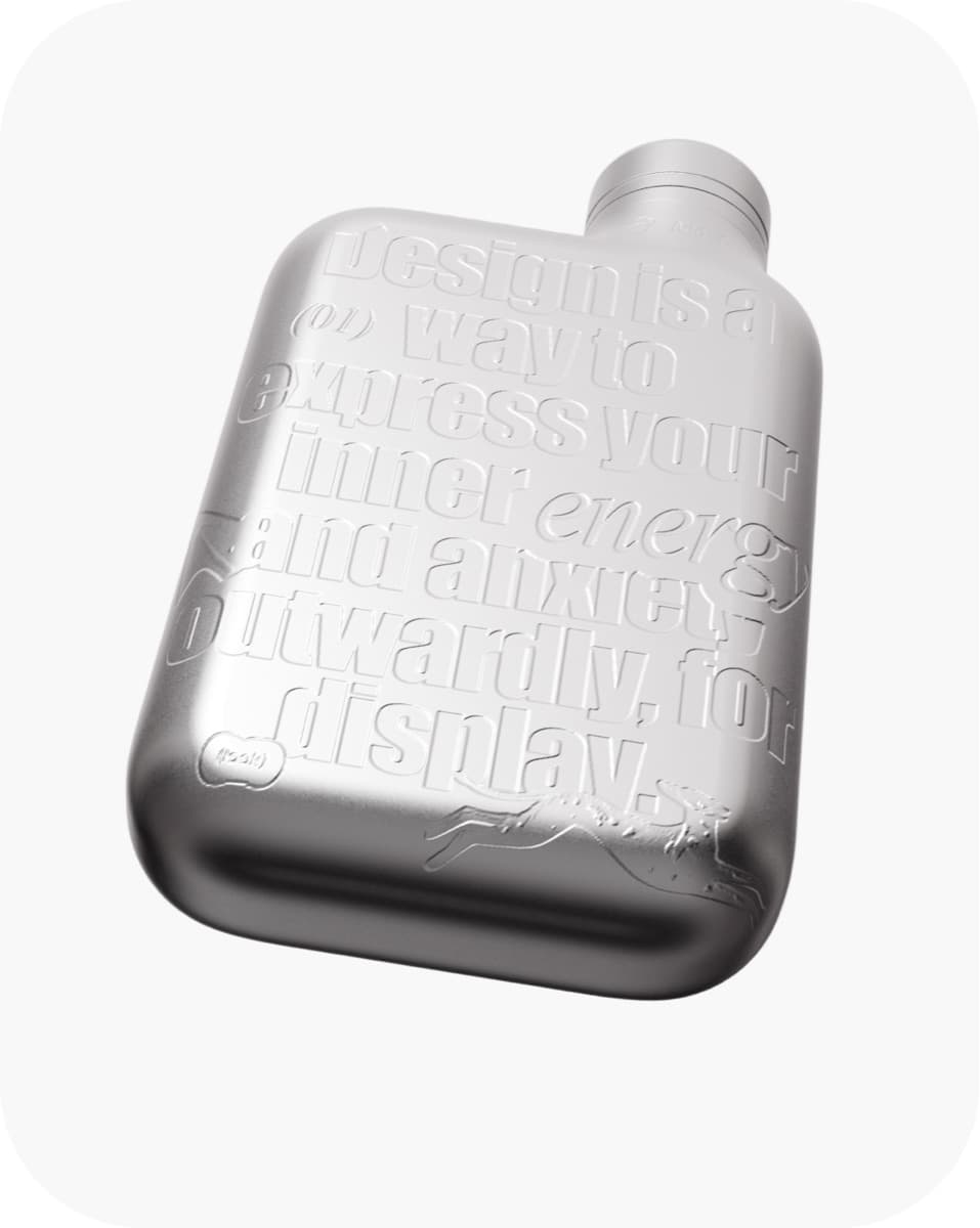 A metal flask with embossed lettering — a studio object